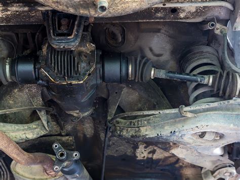 transaxle leak repair cost|Car axle repair cost